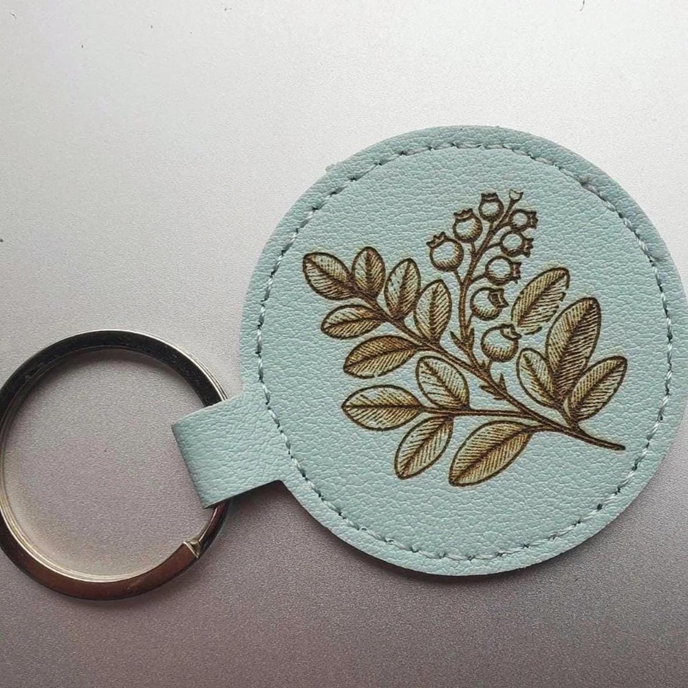 ✨ Blue Engraved Leather Keychain – Huckleberry Design